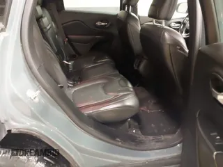 2015 Jeep Cherokee Trailhawk with VIN 1C4PJMBS6FW724931, listed as a IAAI auction lot 41602181 with 153,340 mi miles and . Bid and sale history available at carsss.com. Image 8.