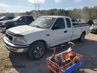 1999 Ford F-150 с VIN 1FTRX17W7XNB56813, выставлен на аукционе Copart как лот 54774965 с пробегом Не указан миль и Списание • Salvage title. История ставок и продаж доступна на DreamBid. Изображение 1.