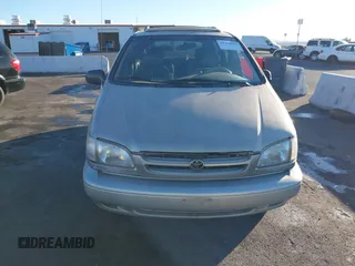 1998 Toyota Sienna LE z VIN 4T3ZF13C1WU051030, wystawiony jako IAAI lot #41259605 z przebiegiem 190 861 mil mil oraz . Historia ofert i sprzedaży dostępna na DreamBid. Obrazek 12.