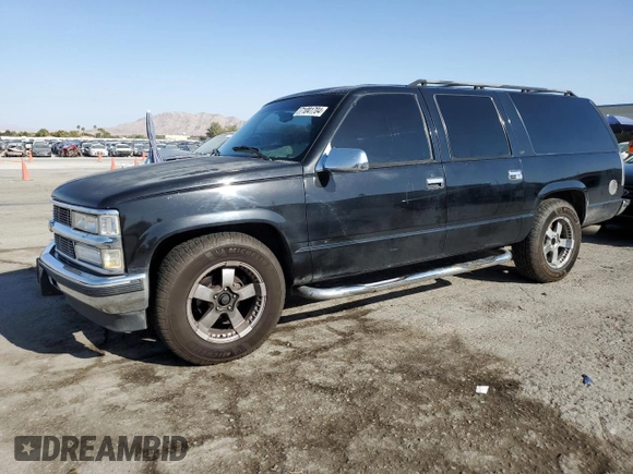 1999 Chevrolet Suburban with VIN 3GNEC16R3XG270099, listed as a Copart auction lot 71041704 with 269,329 mi miles and Salvage Title. Bid and sale history available at carsss.com. Image 1.