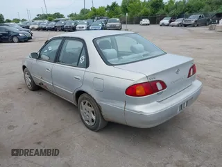 1999 Toyota Corolla VE z VIN 2T1BR12E7XC154444, wystawiony jako IAAI lot #42514069 z przebiegiem 209 377 mil mil oraz . Historia ofert i sprzedaży dostępna na DreamBid. Obrazek 3.