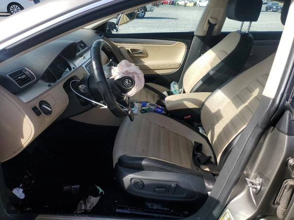 2013 Volkswagen CC R-Line z VIN WVWBN7AN0DE520527, wystawiony jako Copart lot #82555114 z przebiegiem 114 059 mil mil oraz Szkoda całkowita • Salvage title. Historia ofert i sprzedaży dostępna na DreamBid. Obrazek 7.