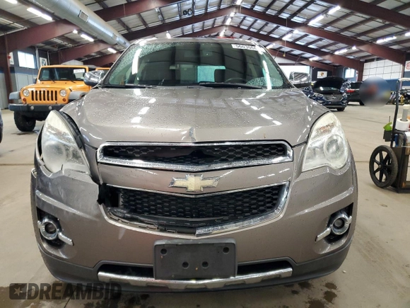2011 Chevrolet Equinox LTZ z VIN 2CNFLGE52B6441939, wystawiony jako Copart lot #56030665 z przebiegiem 101 638 mil mil oraz Szkoda całkowita • Salvage title. Historia ofert i sprzedaży dostępna na DreamBid. Obrazek 5.