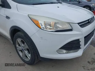2016 Ford Escape SE with VIN 1FMCU9GX1GUA76589, listed as a IAAI auction lot 42014929 with 125,294 mi miles. Bid and sale history available at carsss.com. Image 6.