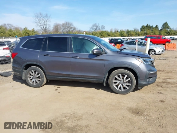 2020 Honda Pilot EX-L с VIN 5FNYF6H52LB039456, выставлен на аукционе IAAI как лот 41831333 с пробегом 118 337 миль миль и . История ставок и продаж доступна на DreamBid. Изображение 13.