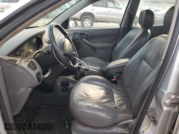 2004 Ford Focus with VIN 3FAFP37Z94R105076, listed as a Copart auction lot 82924224 with 218,253 mi miles and Clean title. Bid and sale history available at DreamBid. Image 7.