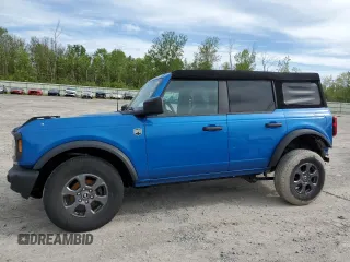 2023 Ford Bronco z VIN 1FMDE5BH7PLB11989, wystawiony jako Copart lot #58302125 z przebiegiem 25 526 mil mil oraz Szkoda całkowita • Salvage title. Historia ofert i sprzedaży dostępna na DreamBid. Obrazek 1.