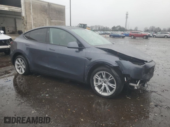 2023 Tesla Model Y Long Range with VIN 7SAYGDEE8PF895293, listed as a Copart auction lot 44208615 with 16,549 mi miles and Salvage Title. Bid and sale history available at DreamBid. Image 4.
