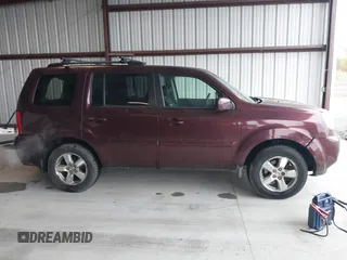 2009 Honda Pilot EX with VIN 5FNYF48499B005597, listed as a IAAI auction lot 41975121 with 309,769 mi miles. Bid and sale history available at carsss.com. Image 13.