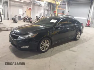 2013 Kia Optima EX z VIN 5XXGN4A77DG257728, wystawiony jako IAAI lot #41735459 z przebiegiem 262 740 mil mil oraz . Historia ofert i sprzedaży dostępna na DreamBid. Obrazek 2.