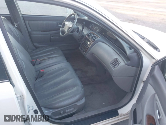 2001 Toyota Avalon XL with VIN 4T1BF28B51U155528, listed as a IAAI auction lot 41765538 with Not Provided miles and . Bid and sale history available at DreamBid. Image 5.