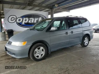 2000 Honda Odyssey EX с VIN 2HKRL1867YH555314, выставлен на аукционе Copart как лот 61065505 с пробегом 165 993 миль миль и Списание • Salvage title. История ставок и продаж доступна на DreamBid. Изображение 1.