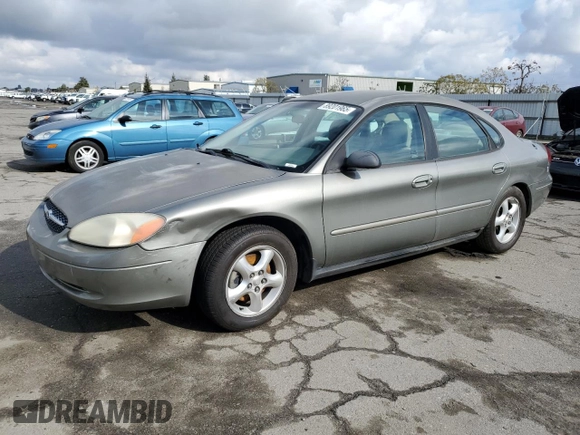2001 Ford Taurus LX with VIN 1FAFP52U01A131563, listed as a Copart auction lot 89201965 with 79,048 mi miles and Salvage title. Bid and sale history available at DreamBid. Image 1.