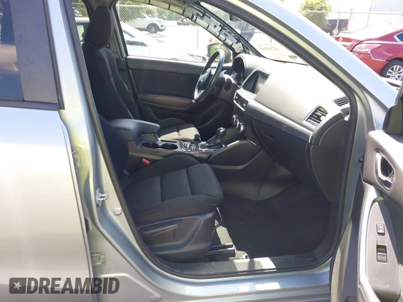 2016 Mazda CX-5 Touring z VIN JM3KE4CY4G0646114, wystawiony jako IAAI lot #42269181 z przebiegiem 58 252 mil mil oraz . Historia ofert i sprzedaży dostępna na DreamBid. Obrazek 5.