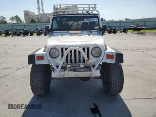 1999 Jeep Wrangler Sport with VIN 1J4FY19SXXP464096, listed as a Copart auction lot 61233105 with 167,350 mi miles and Clean title. Bid and sale history available at DreamBid. Image 5.