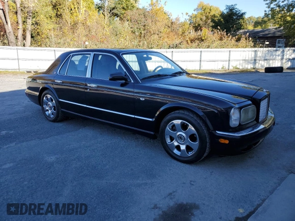 2001 Bentley Arnage with VIN SCBLC31E21CX05644, listed as a Copart auction lot 77706154 with 57,446 mi miles and Clean Title. Bid and sale history available at DreamBid. Image 4.