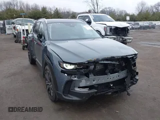 2024 Mazda CX-50 Premium z VIN 7MMVABDY8RN234014, wystawiony jako IAAI lot #41195391 z przebiegiem 5949 mil mil oraz . Historia ofert i sprzedaży dostępna na DreamBid. Obrazek 1.