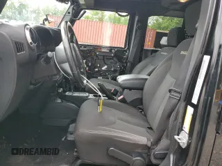 2016 Jeep Wrangler Unlimited Sahara with VIN 1C4BJWEG8GL150249, listed as a Copart auction lot 57574525 with 104,206 mi miles and Salvage title. Bid and sale history available at DreamBid. Image 7.