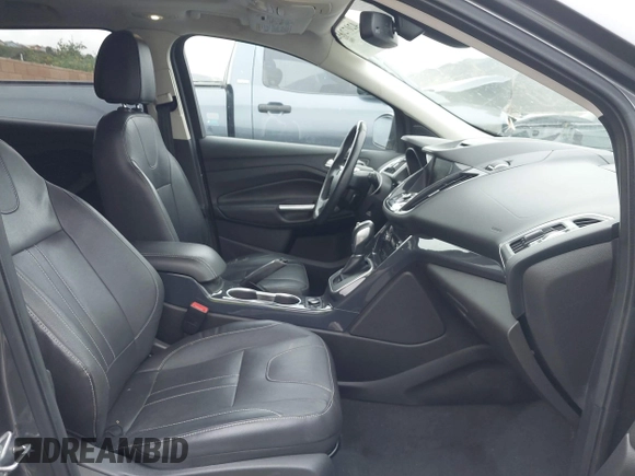 2013 Ford Escape Titanium with VIN 1FMCU0J95DUC71130, listed as a IAAI auction lot 42072032 with 144,054 mi miles and . Bid and sale history available at carsss.com. Image 5.