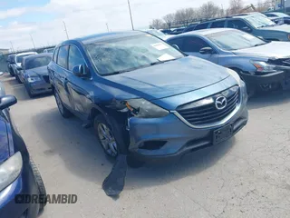 2015 Mazda CX-9 Sport with VIN JM3TB2BV7F0458193, listed as a IAAI auction lot 41886385 with 154,677 mi miles and . Bid and sale history available at carsss.com. Image 1.