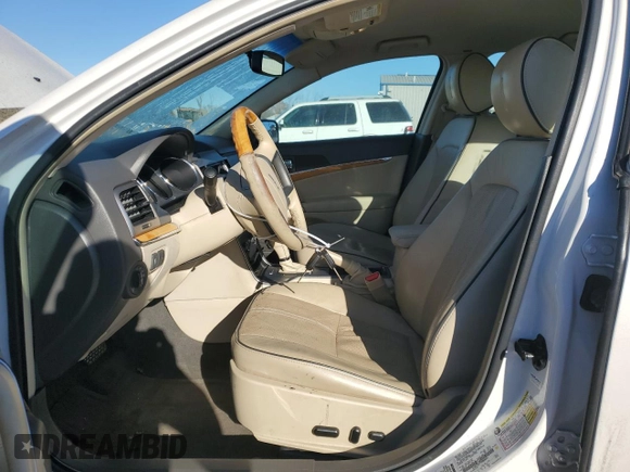2012 Lincoln MKZ with VIN 3LNHL2GC7CR808044, listed as a Copart auction lot 77739974 with 84,288 mi miles and Salvage Title. Bid and sale history available at carsss.com. Image 7.