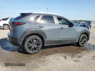 2023 Mazda CX-30 S Carbon Edition with VIN 3MVDMBCM1PM553374, listed as a Copart auction lot 62080975 with 51,527 mi miles and Salvage title. Bid and sale history available at DreamBid. Image 3.