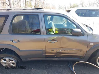 2006 Mazda Tribute i with VIN 4F2YZ92Z16KM25216, listed as a IAAI auction lot 41664006 with 228,222 mi miles and . Bid and sale history available at carsss.com. Image 13.