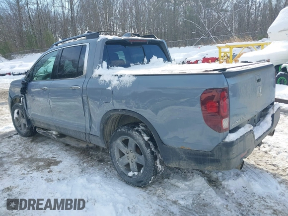 2022 Honda Ridgeline RTL-E with VIN 5FPYK3F73NB035246, listed as a IAAI auction lot 41532768 with 37,116 mi miles and . Bid and sale history available at DreamBid. Image 3.