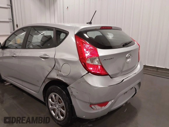 2014 Hyundai Accent GS with VIN KMHCT5AE4EU150877, listed as a IAAI auction lot 41989235 with 68,918 mi miles. Bid and sale history available at carsss.com. Image 6.
