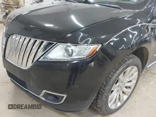 2014 Lincoln MKX with VIN 2LMDJ8JK4EBL16245, listed as a IAAI auction lot 42137824 with 184,479 mi miles. Bid and sale history available at carsss.com. Image 6.