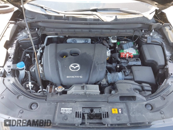 2020 Mazda CX-5 Sport with VIN JM3KFABM2L0761184, listed as a IAAI auction lot 41847768 with 47,582 mi miles. Bid and sale history available at carsss.com. Image 10.