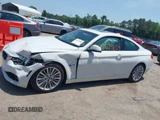 2014 BMW 4 Series 435i with VIN WBA3R1C52EF729201, listed as a IAAI auction lot 42579604 with 145,277 mi miles and . Bid and sale history available at DreamBid. Image 14.