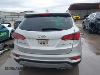 2017 Hyundai Santa Fe Sport 2.0T with VIN 5XYZU4LA4HG437089, listed as a IAAI auction lot 41457614 with 150,277 mi miles. Bid and sale history available at carsss.com. Image 17.