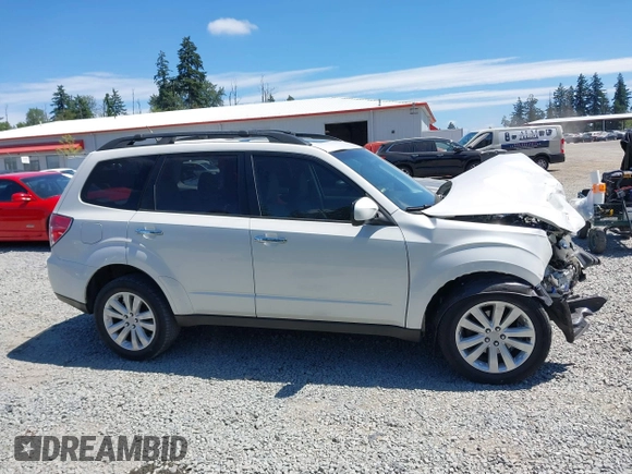 2012 Subaru Forester X Premium with VIN JF2SHADC2CH469660, listed as a IAAI auction lot 42639330 with 101,961 mi miles and . Bid and sale history available at DreamBid. Image 14.