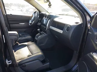 2016 Jeep Compass High Altitude Edition with VIN 1C4NJCEA4GD806612, listed as a IAAI auction lot 41538090 with 104,447 mi miles. Bid and sale history available at carsss.com. Image 5.