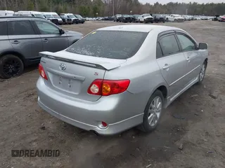 2010 Toyota Corolla with VIN 2T1BU4EE4AC454655, listed as a IAAI auction lot 41858963 with 209,816 mi miles. Bid and sale history available at carsss.com. Image 4.