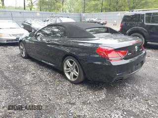 2017 BMW 6 Series 650i xDrive z VIN WBA6F7C52HD930816, wystawiony jako IAAI lot #42168478 z przebiegiem 89 191 mil mil oraz . Historia ofert i sprzedaży dostępna na DreamBid. Obrazek 3.