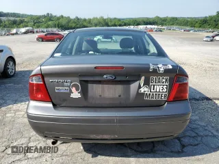 2007 Ford Focus S с VIN 1FAFP34N97W294489, выставлен на аукционе Copart как лот 60376985 с пробегом 155 295 миль миль и Списание • Salvage title. История ставок и продаж доступна на DreamBid. Изображение 6.