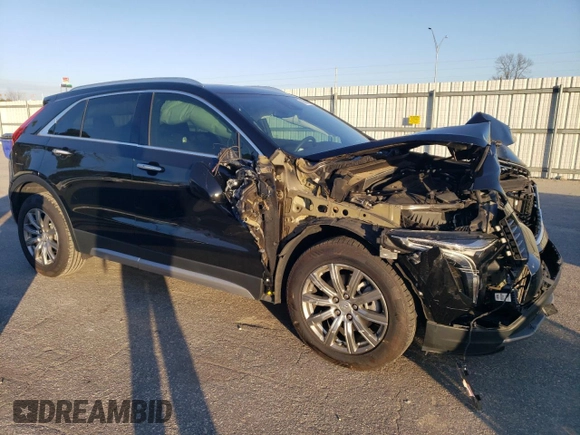 2020 Cadillac XT4 FWD Premium Luxury z VIN 1GYFZCR44LF056476, wystawiony jako Copart lot #43559495 z przebiegiem 51 076 mil mil oraz Szkody całkowita. Historia ofert i sprzedaży dostępna na DreamBid. Obrazek 4.