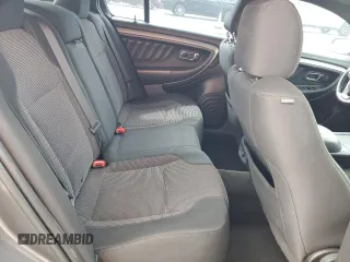 2014 Ford Taurus SEL z VIN 1FAHP2E80EG174910, wystawiony jako Copart lot #56070945 z przebiegiem 147 201 mil mil oraz Szkody całkowita. Historia ofert i sprzedaży dostępna na DreamBid. Obrazek 10.