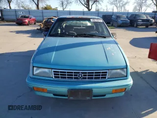 1994 Plymouth Sundance z VIN 1P3AP28K0RN197432, wystawiony jako Copart lot #48218915 z przebiegiem 97 625 mil mil oraz Szkody całkowita. Historia ofert i sprzedaży dostępna na DreamBid. Obrazek 5.