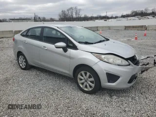 2012 Ford Fiesta SE with VIN 3FADP4BJ5CM170288, listed as a Copart auction lot 49471605 with 104,851 mi miles and Salvage Title. Bid and sale history available at DreamBid. Image 4.