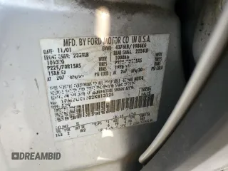 2002 Ford Escape XLS Choice z VIN 1FMYU01102KB13125, wystawiony jako Copart lot #59034495 z przebiegiem 202 253 mil mil oraz Szkoda całkowita • Salvage title. Historia ofert i sprzedaży dostępna na DreamBid. Obrazek 13.