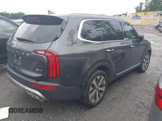 2021 Kia Telluride S with VIN 5XYP64HC8MG127498, listed as a IAAI auction lot 42371890 with 100,748 mi miles and . Bid and sale history available at DreamBid. Image 4.