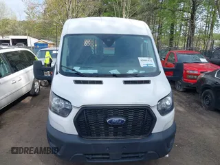 2021 Ford Transit Cargo with VIN 1FTBR1C85MKA48173, listed as a IAAI auction lot 42005472 with 81,980 mi miles and . Bid and sale history available at DreamBid. Image 12.