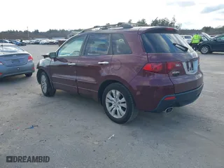 2010 Acura RDX Tech Pkg with VIN 5J8TB1H57AA001303, listed as a IAAI auction lot 41260059 with 217,546 mi miles. Bid and sale history available at carsss.com. Image 3.
