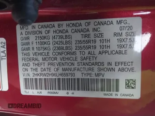 2020 Honda CR-V Touring with VIN 2HKRW2H96LH659793, listed as a IAAI auction lot 41145758 with 113,344 mi miles and . Bid and sale history available at DreamBid. Image 9.