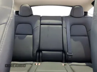 2024 Tesla Model Y Long Range with VIN 7SAYGDEEXRA253111, listed as a Copart auction lot 60929295 with 16,423 mi miles and Salvage title. Bid and sale history available at DreamBid. Image 10.