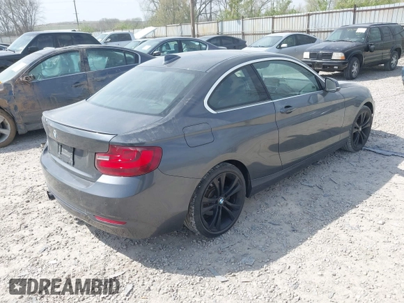 2016 BMW 2 Series 228i xDrive with VIN WBA1G9C59GV599731, listed as a IAAI auction lot 42074240 with 70,872 mi miles and . Bid and sale history available at DreamBid. Image 4.