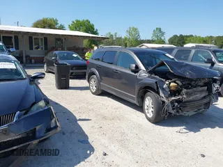 2017 Dodge Journey SXT with VIN 3C4PDCBG4HT589891, listed as a IAAI auction lot 42017420 with 135,740 mi miles and . Bid and sale history available at carsss.com. Image 1.
